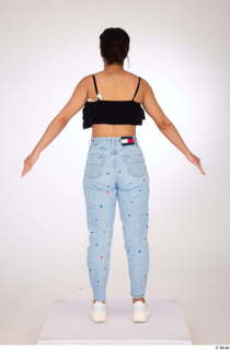 Jimena a-pose black ruffled crop top blue embellished jeans casual…